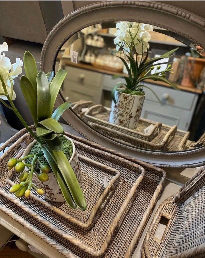 A small handmade rattan morning  tray in a natural and grey weave 33 x 20 x 5 cm