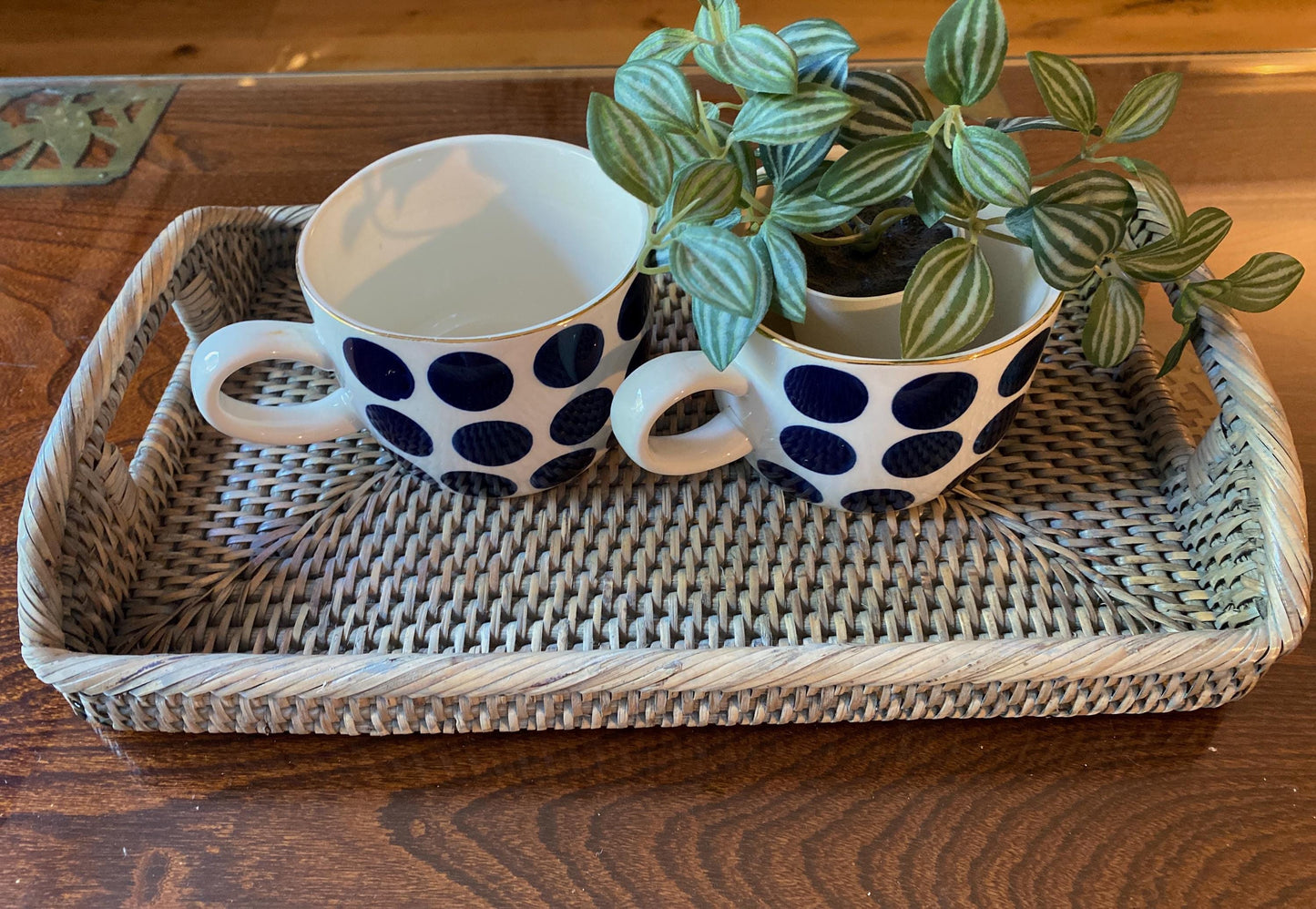 A small handmade rattan morning  tray in a natural and grey weave 33 x 20 x 5 cm