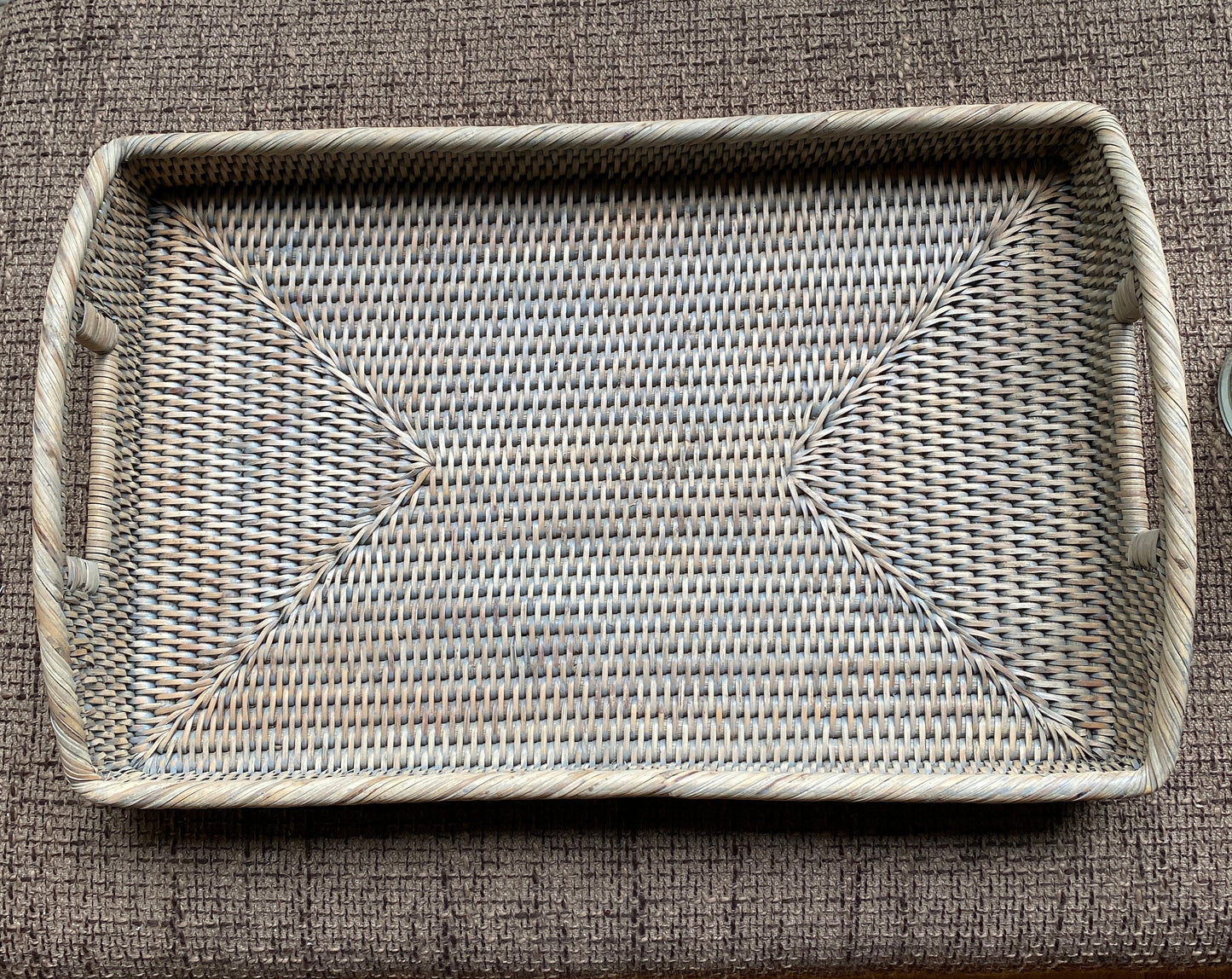 A medium handmade rattan morning  tray in a natural and grey weave 45 x 29 x 5 cm